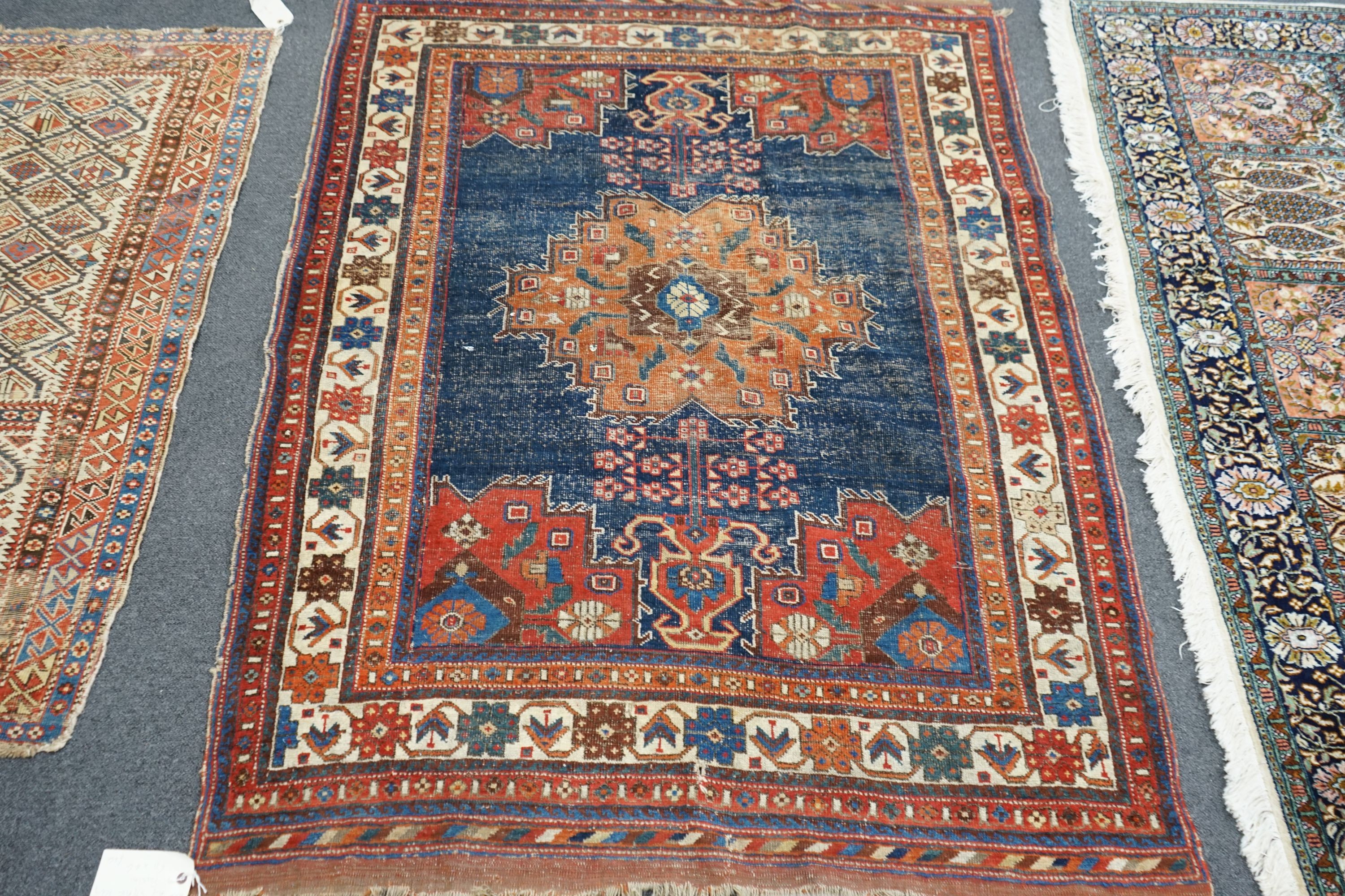 An antique Afshar blue ground rug, 180 x 130cm